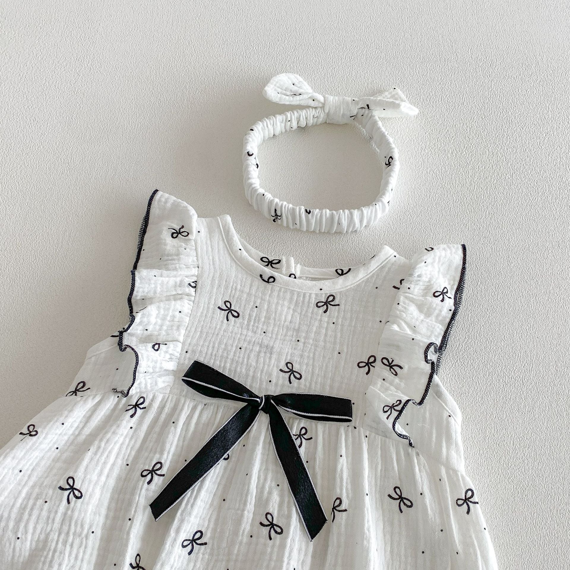 Ruffle Bow Pattern Onesie with Bow