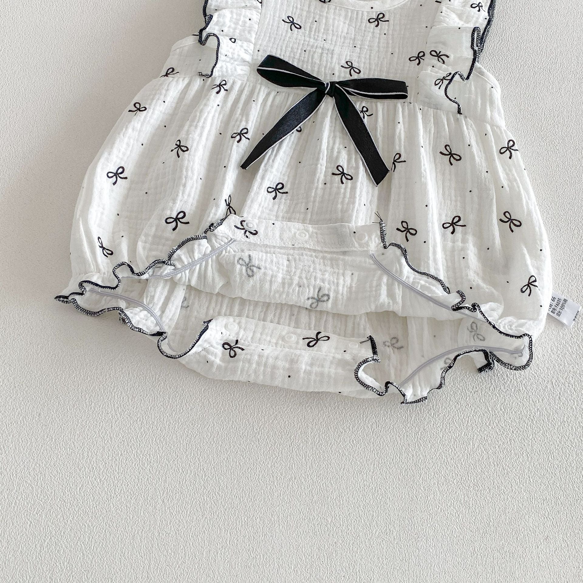 Ruffle Bow Pattern Onesie with Bow